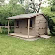 10 x 12 high classic  with double doors, ramp and a 4 foot side porch.